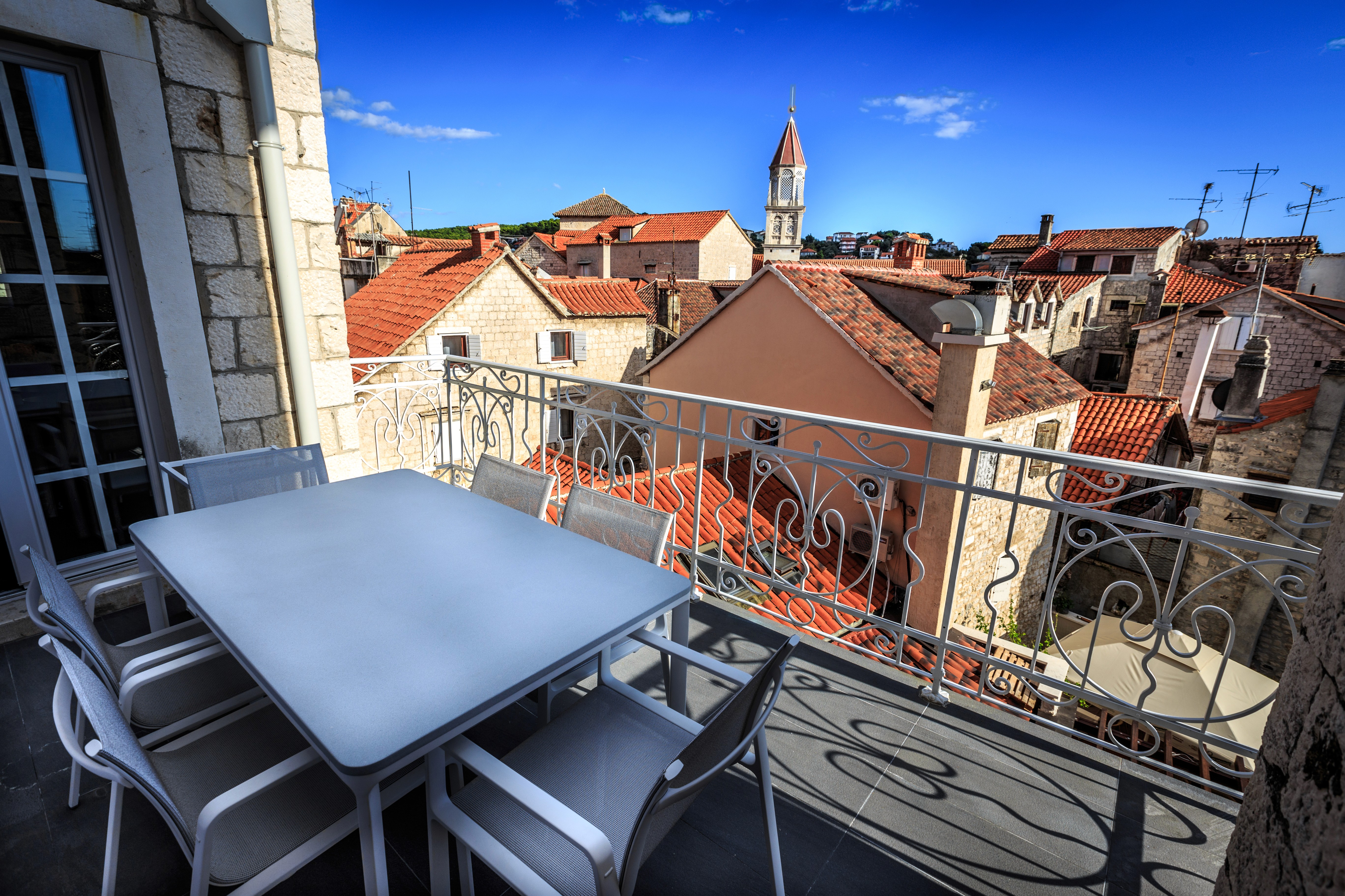 Dining table on the rooftop terrace